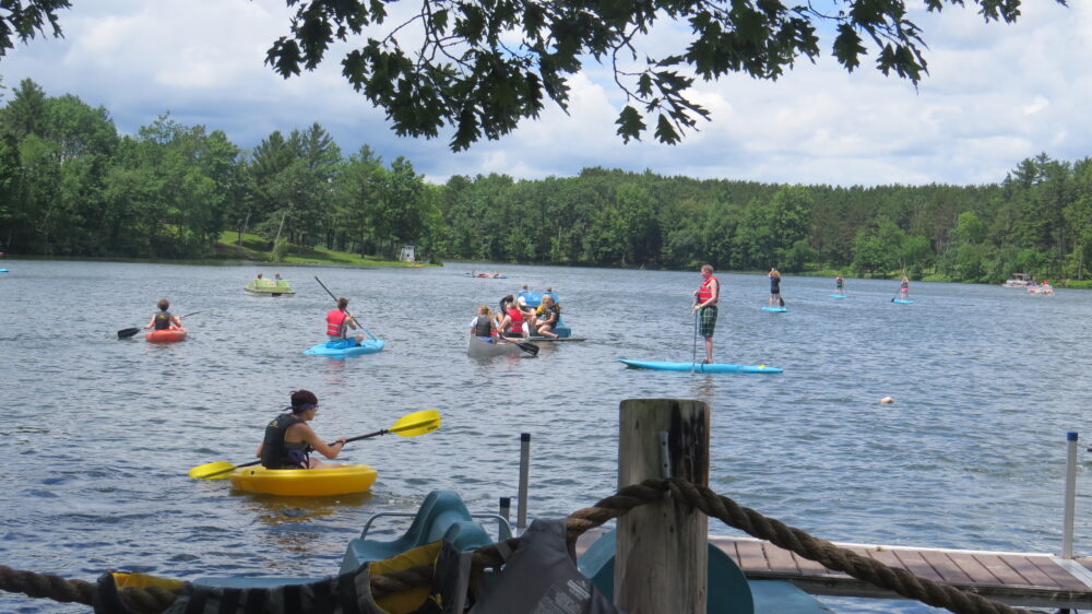 Photo of youth in boats on Lions Lake