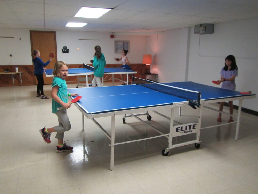 Photo of youth playing ping pong